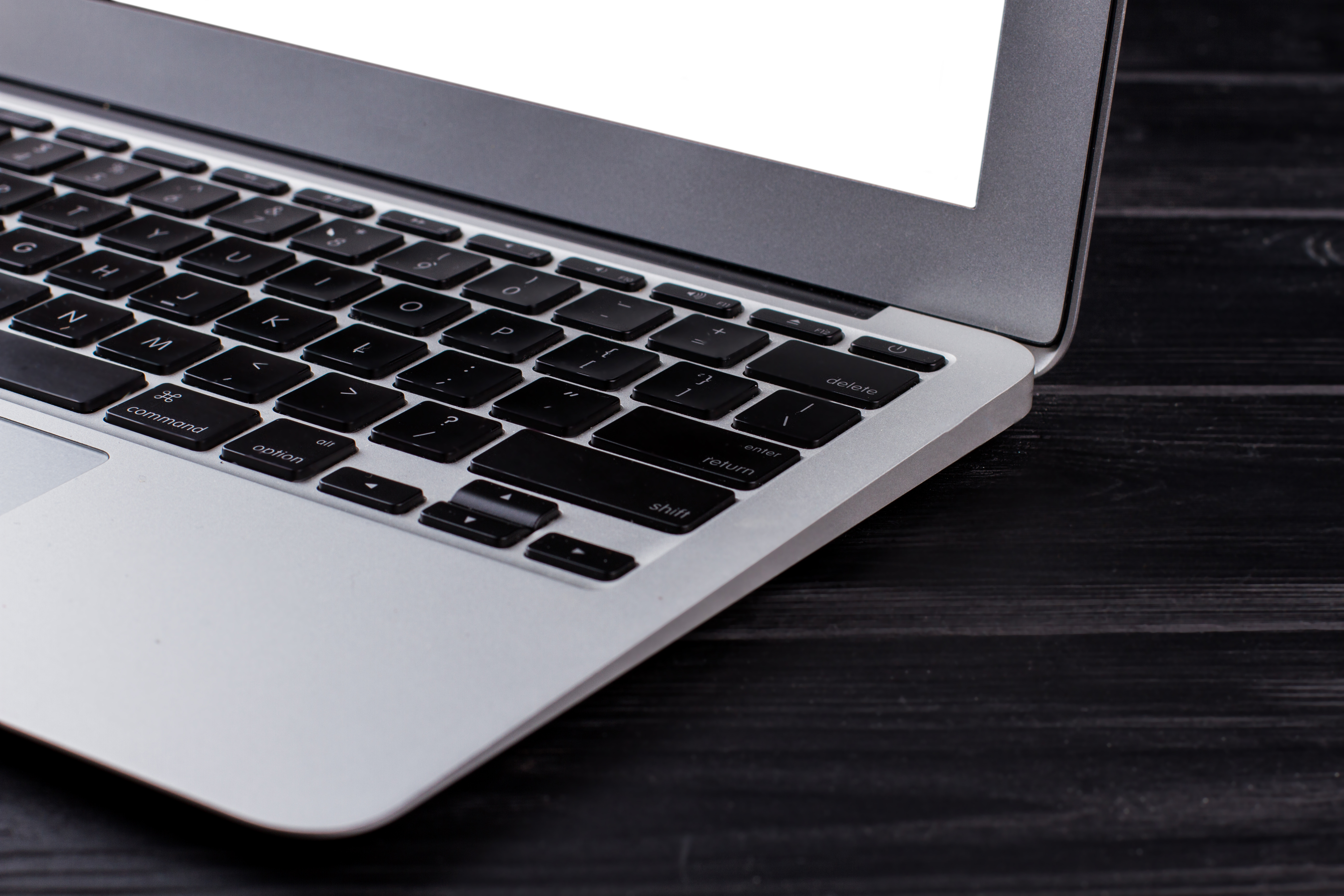 close-up-silver-laptop-with-black-keyboard-2023-11-27-05-21-30-utc.jpg