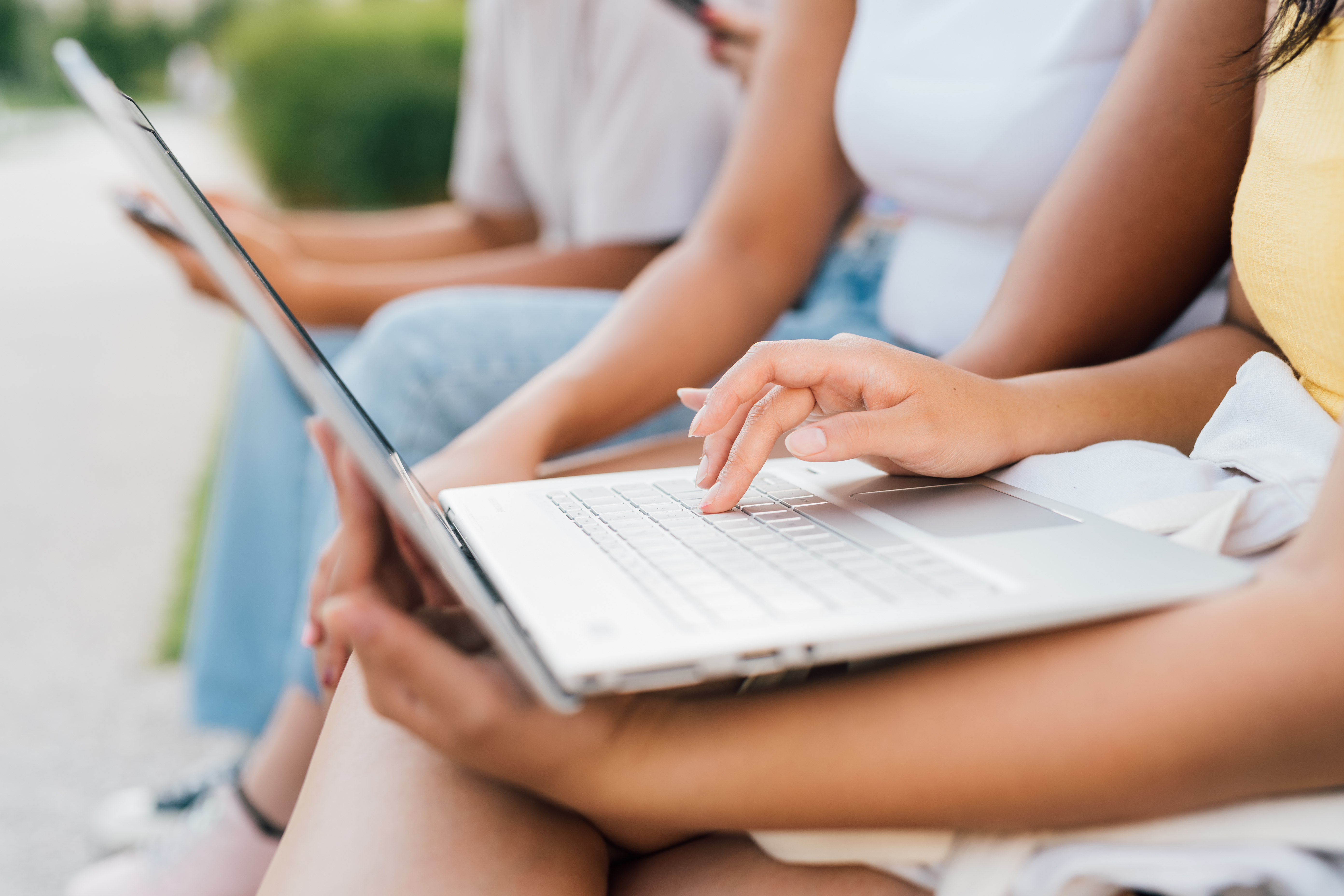 close-up-woman-hand-outdoor-typing-notebook-keyboa-2023-11-27-05-07-58-utc.jpg