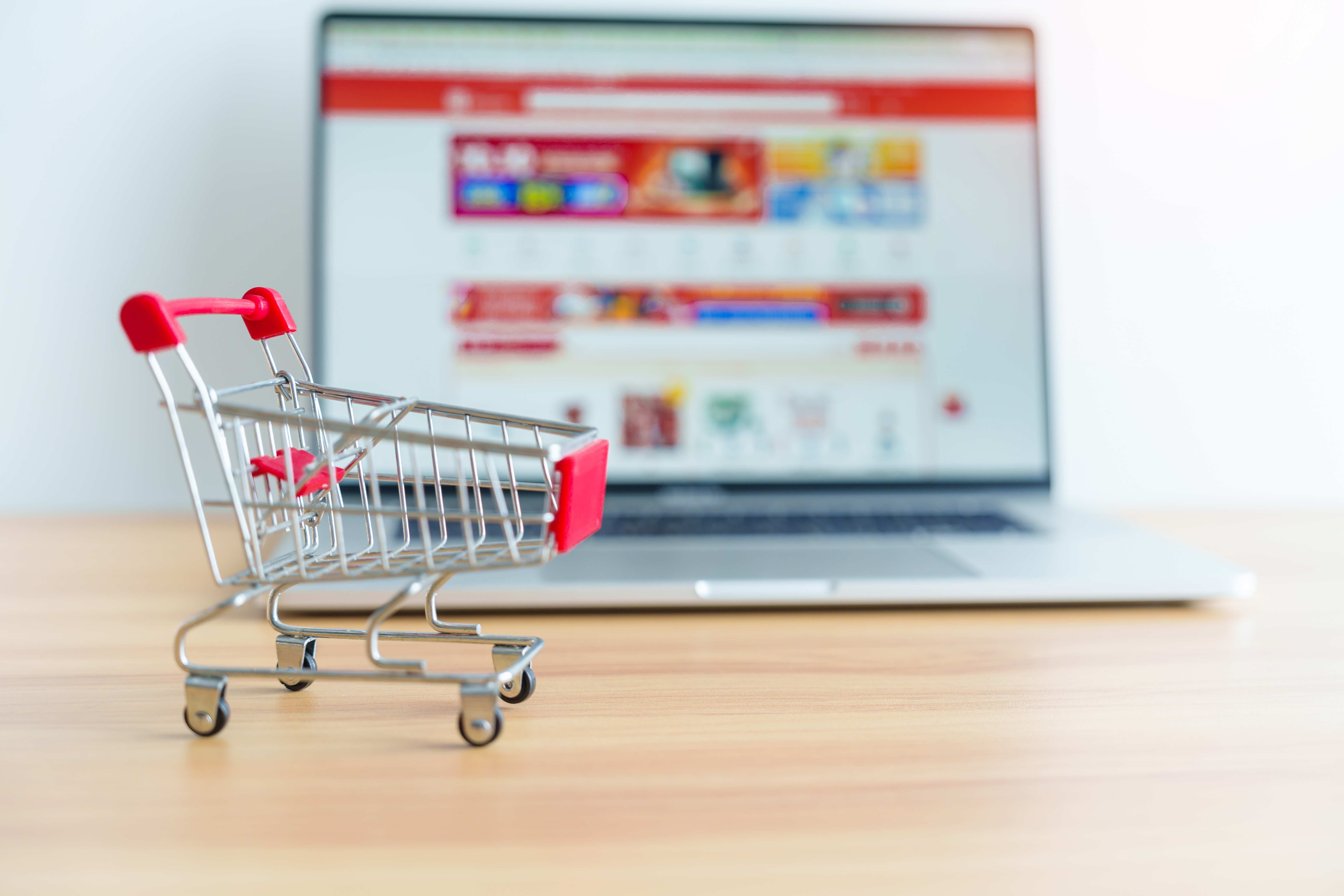 shopping-cart-and-laptop-computer-with-marketplace-2023-11-27-04-55-00-utc.jpg